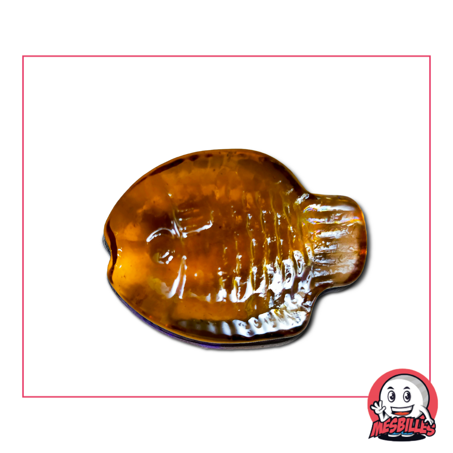 Photo of a finely-detailed, amber-coloured Koi fish-shaped glass marble, sold individually on My-Glassmarbles.