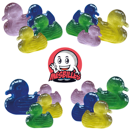 Picture of the My-Glassmarbles Mascot surrounded by Yellow Duck Extra-flat marbles, the sun of the Shaped Marbles at My-Glassmarbles